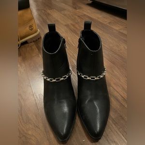 Black booties with silver chain